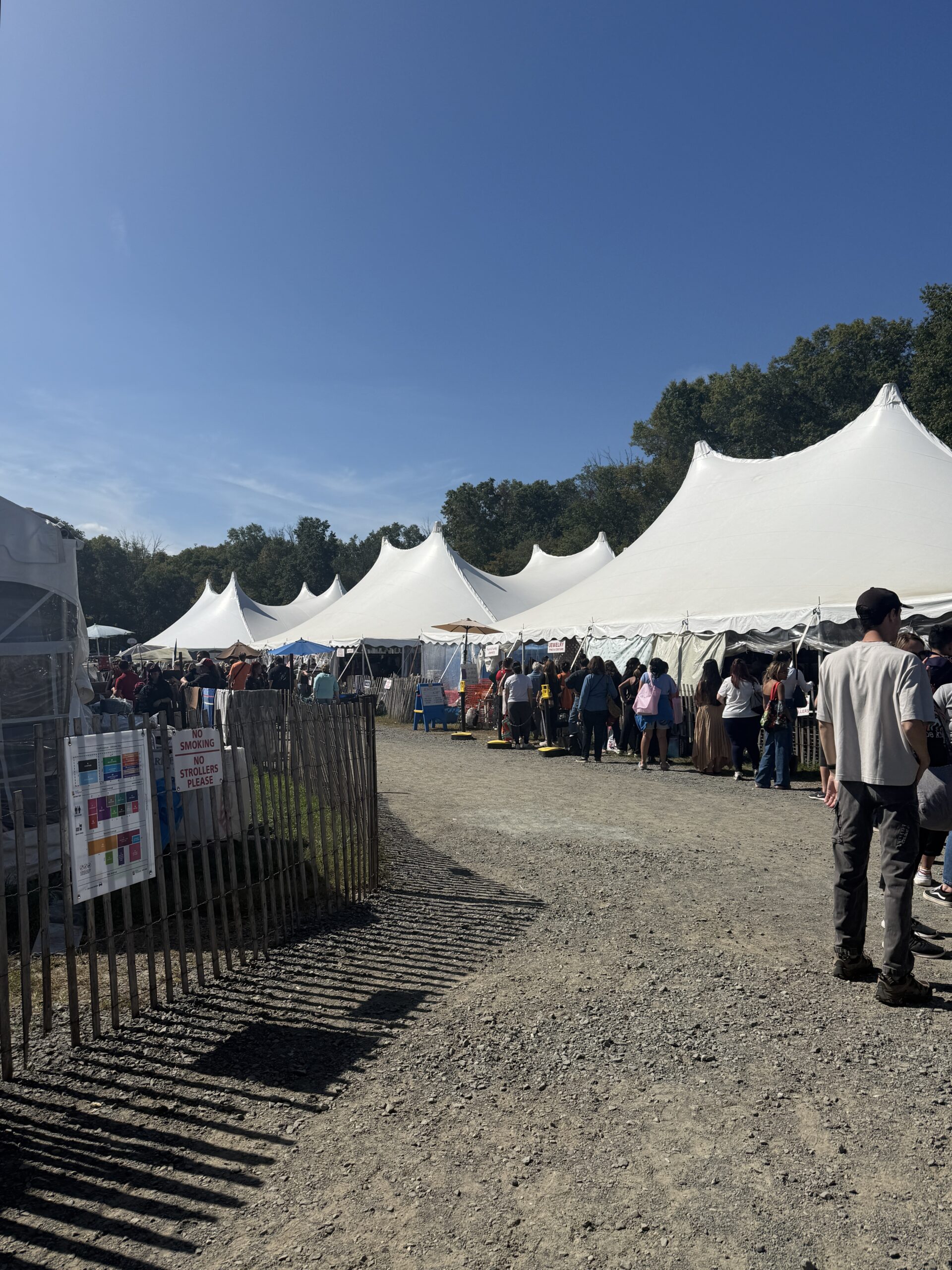 people on line for rummage sale tents