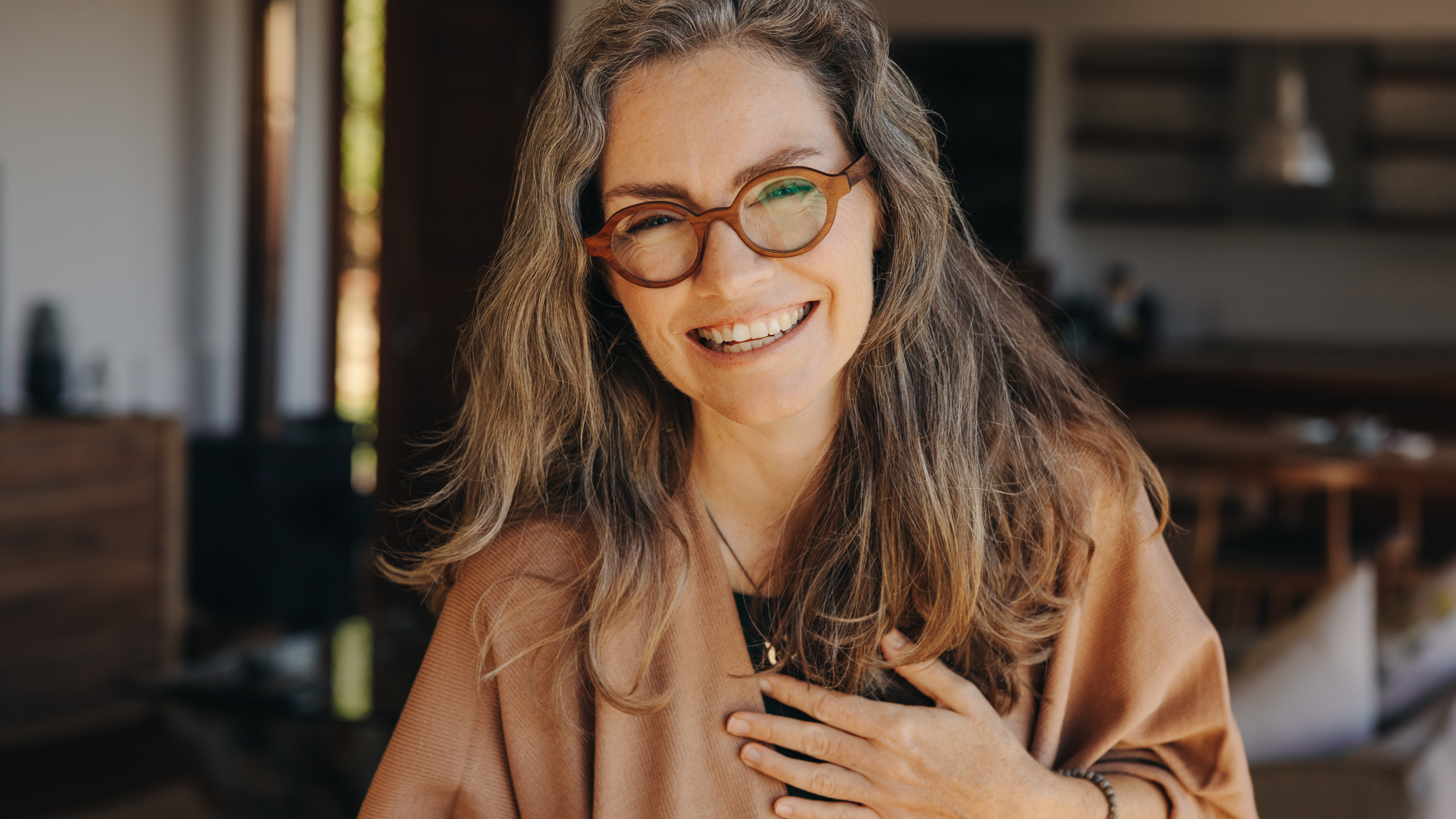 Cheerful senior woman smiling at the camera