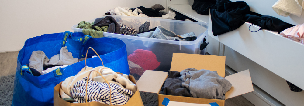 closet clean out boxes full of clothes