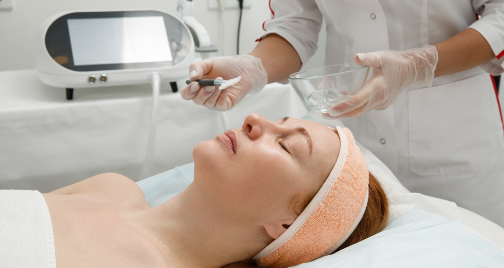 collagen treatment in progress on a woman in a doctor's office