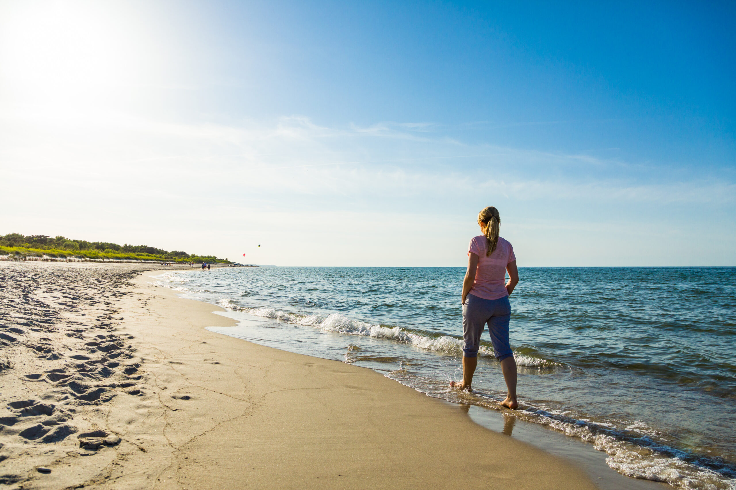 Woman walking on beach